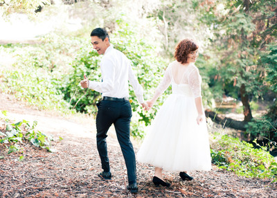 bride and groom walking away shot wedding