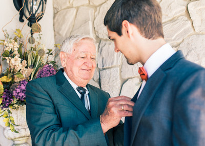 groom getting ready shot with his father