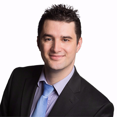 man executive portrait headshot in studio with white backdrop