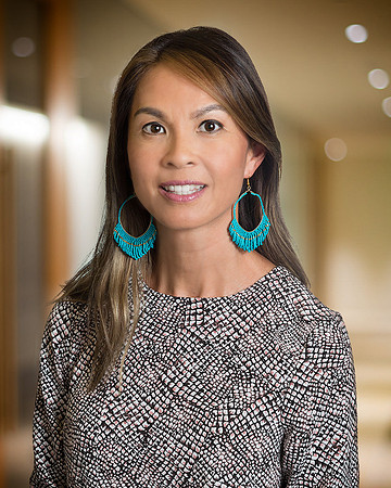 woman executive portrait headshot with defocused blurred background
