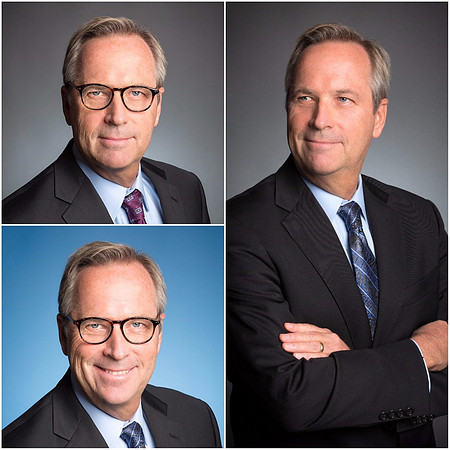 CEO Corporate headshot in studio with blue and gray backdrop