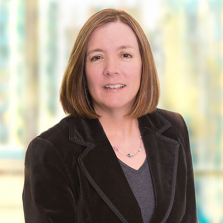 woman_executive__business_corporate_headshot_with_blurred_office_background