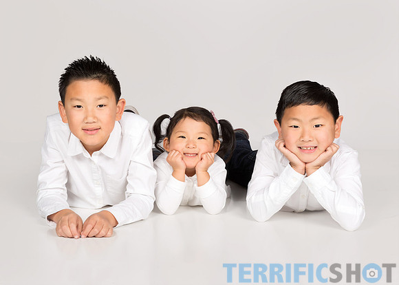family_holiday_portrait_studio_gray_background-12