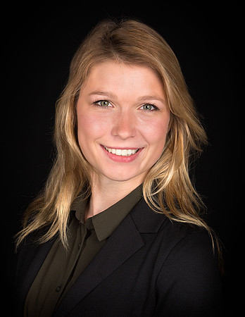 woman_blond_hair_headshot_studio_black_background