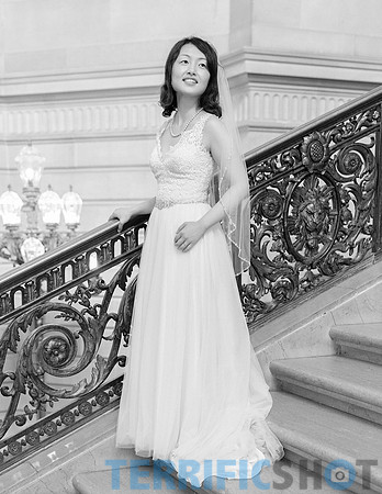 wedding_bride_posing_on_stairs_san_francisco_city_hall_black_white