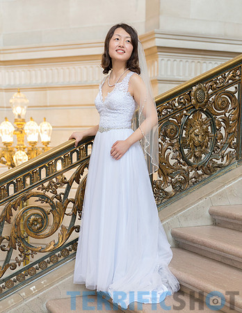 wedding_bride_posing_on_stairs_san_francisco_city_hall