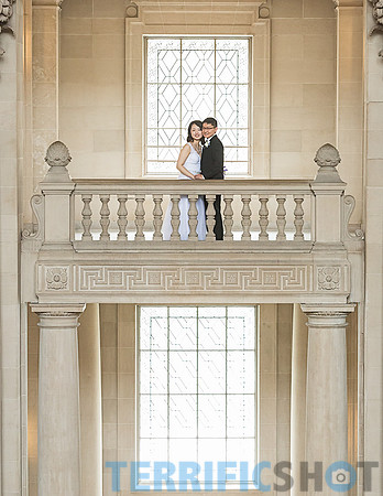 wedding_couple_balcony_san_francisco_city_hall+windows