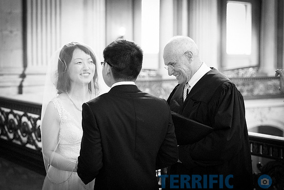 wedding_couple_ceremony_auditorium_san_francisco_city_hall_black_and_white