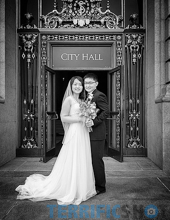 wedding_couple_posing_stairs_city_hall_san_francisco_black_white