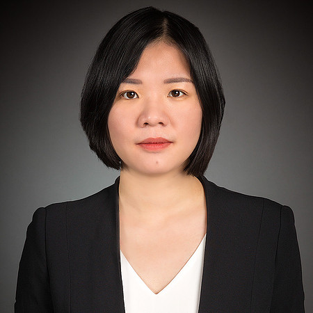 woman_with_black_jacket_and_white_shirt_portrait_studio_gray_backdrop