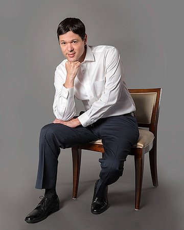 portrait_,am_seating_low_chair_headshot