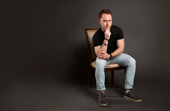 modeling_actor_sitting_portrait_studio