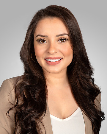 woman_headshot_studio_gray_bright_background