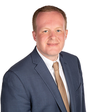 man_headshot_with_white_background_studio