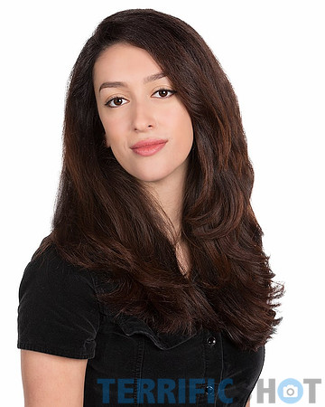 woman_portrait_headshot_with_black_dress-and_white_backdrop-min